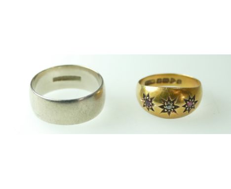 18ct White gold wedding band, size P and diamond and ruby gypsy set 18ct ring, size K (total weight 8.8 grams)