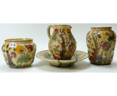 A collection of H.G Wood India Tree embossed items to include vases, planters, water jugs, tile (4)