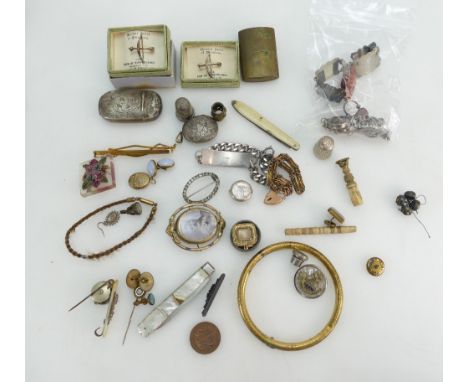 An assortment of silver and other jewellery, vestas, lighter, seals, badges, thimbles etc.