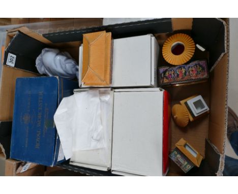 A mixed collection of boxed ceramic item to include oriental influenced musical boxes etc