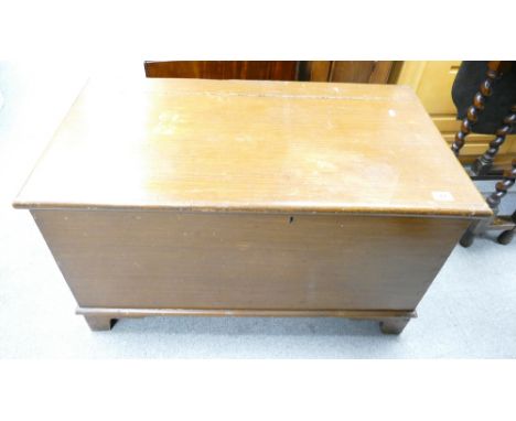 A 20th century pine chest in original scrumble on bracket feet.