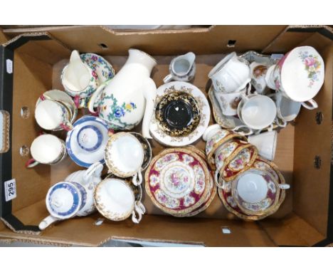 A mixed collection of ceramic items to include Royal Albert Lady Hamilton patterned cups, saucers and side plates, similar Re
