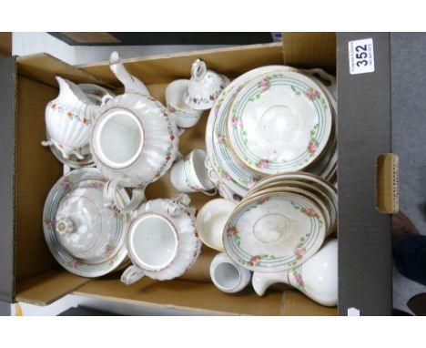 A collection of late 19th century hand decorated floral tea and dinnerware to include cups, saucers and side plates etc