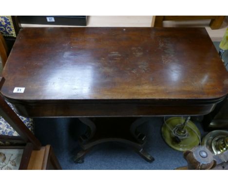 A regency mahogany folding card table.