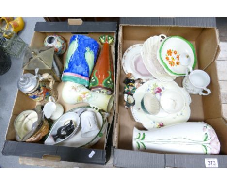 A mixed collection of ceramic items to include Art Nouveau hand decorated vases, German beer steins, wall clocks, damaged Roy