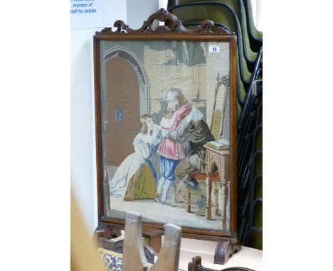 A Victorian mahogany cased tapestry fire screen.