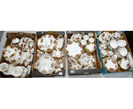 A large collection Royal Albert old country roses including plates, tureen & cover, tea sets, teapot, dishes, soup cups etc (
