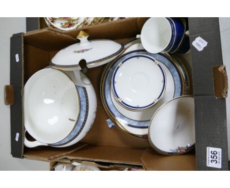 A collection of Wedgwood dinnerware in the Crestwick design to include large soup bowl, dinner plates, serving platters, cups