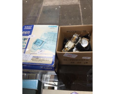 BOX OF WATCHES  AND CASIO WRIST CAMERA    C
