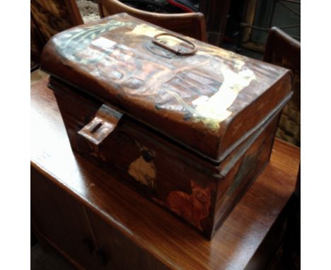 AN OLD DECORATED TIN TRUNK AND CONTENTS