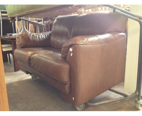 A BROWN 2 SEATER LEATHER SOFA