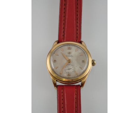 A vintage gold plated CYMA watersport gents' manual wristwatch, the machine-tooled face with Arabic numerals and subsidiary s