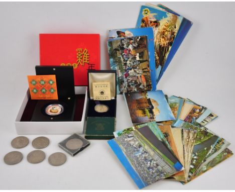 An assortment of commemorative and other coins, to include two 1951 Festival of Britain five Shillings pieces, a 1965 Churchi