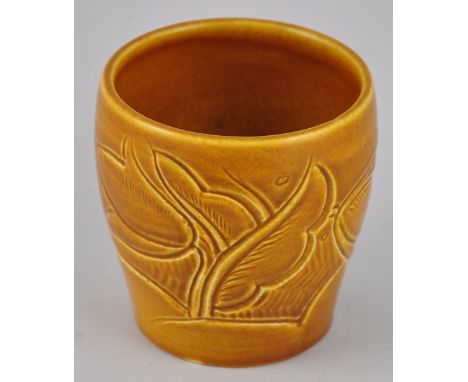 A 1930s Susie Cooper Art Deco mustard glaze vase with incised floral decoration, signed, H. 9cm