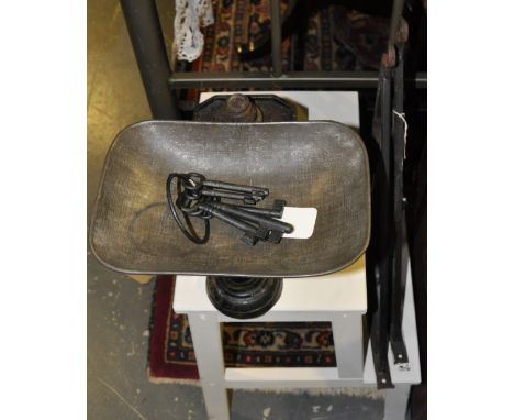 A set of vintage cast iron balance scales together with a ring of reproduction keys, a pair of metal brackets and a painted s