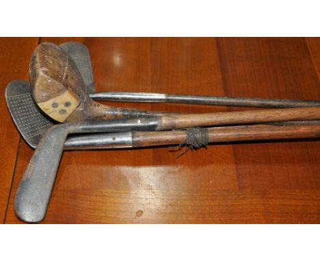 Five vintage golf clubs, among which several hickory-shafted examples (5)