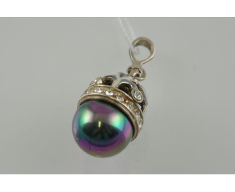 A Russian silver and faux pearl, marcasite egg pendant