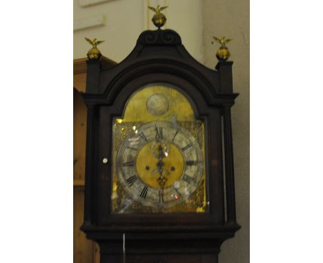 A George III mahogany longcase clock, the arched brass dial with silvered chapter ring, subsiduary seconds and date aperture,