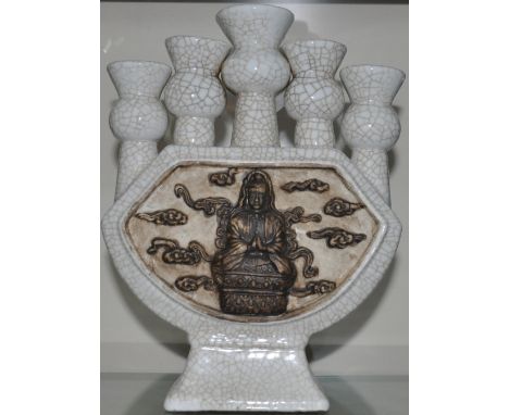 A Chinese crackle glaze five neck vase, the body with embossed deity, three sages verso, H. 28.5cm