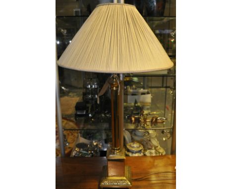 A brass table lamp of classical fluted column form on square stepped base, H. 70cm