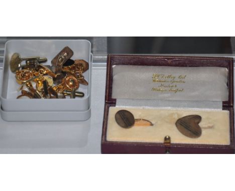 A pair of silver gilt cufflinks, the oval chain linked plaques with engine turning, together with six other pairs of cufflink
