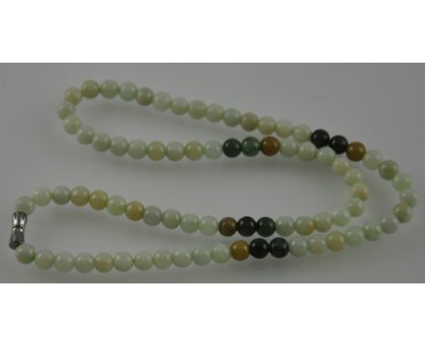 A light and dark jade bead necklace