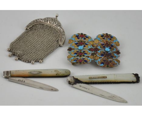 Two early 19th century silver knives with mother of pearl handles together with a white metal mesh purse and an enamelled bel