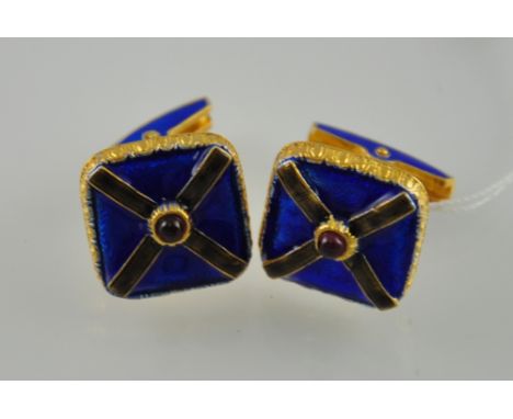 A pair of Russian silver blue enamel cufflinks inset red cabouchon stones