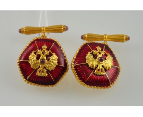 A pair of Russian silver gilt red enamel chain and bar cufflinks with eagle crests