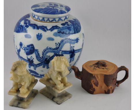 A large Chinese blue and white lidded ginger jar, decorated with scenes of children at play, H. 23cm, together with a pair of