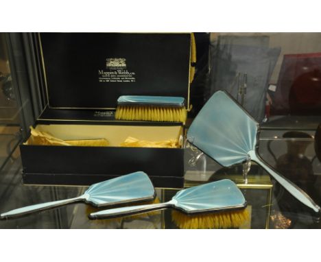 A silver and pale blue enamel five piece dressing table set, Mappin and Webb, Birmingham 1932 (with original card boxes)