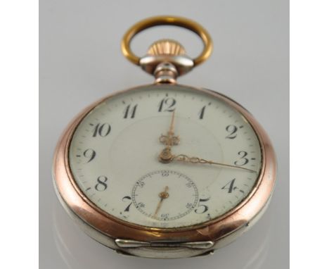 An early 20th Century Continental silver and gold keyless pocket watch, the circular enamel dial with subsidiary seconds