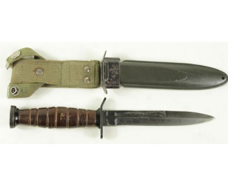 Knife: US M3 fighting knife in its US M8A1 plastic scabbard. Blade 6.5" marked 'U.S. M3'. Some wear. Good condition overall. 