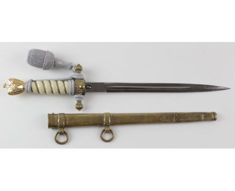 German WW2 Naval Dagger with metal scabbard and dagger knot. Blade maker marked 'E.W.Holler Solingen'. With replacement handl