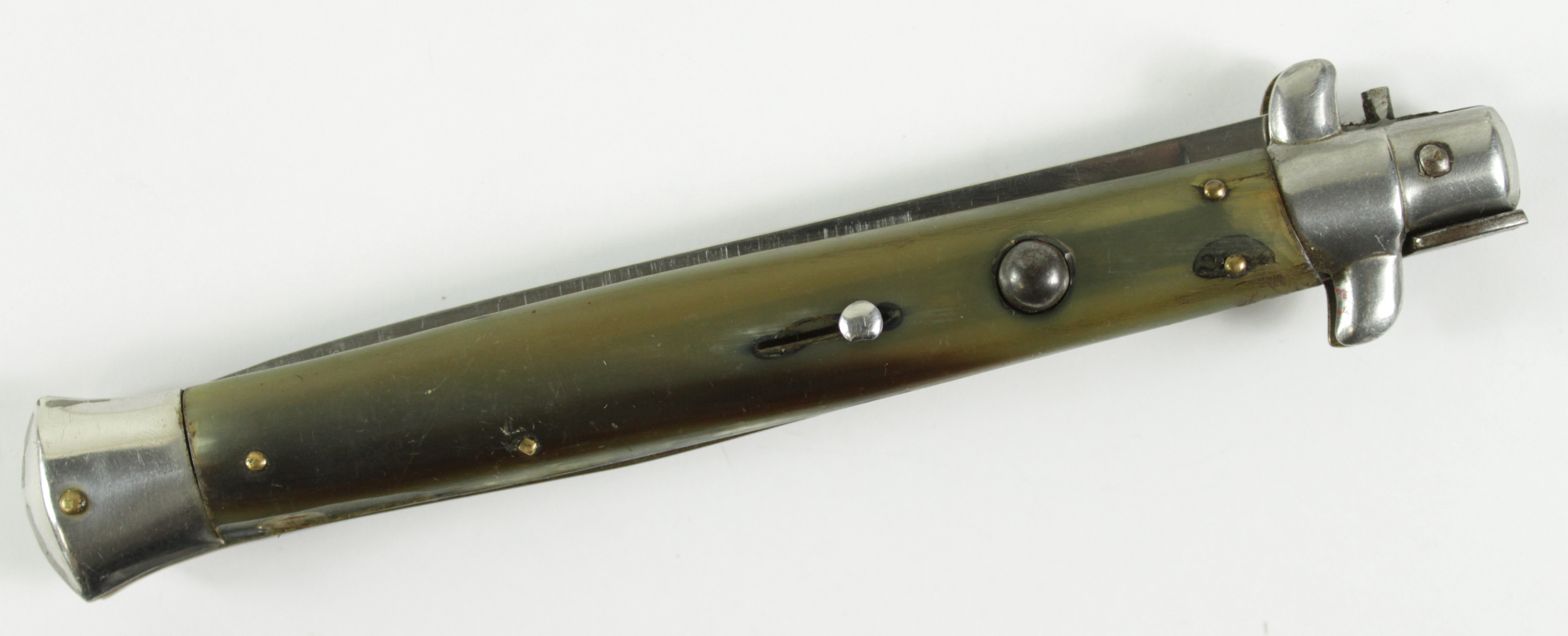 Knife A good and impressive lock knife. Slim edged blade 6". Ricasso