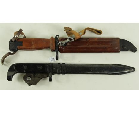 Russian Bayonets: 1) AKM Bayonet in composition scabbard in v.g.c.  2) AK47 in its steel scabbard. v.g.c.   (2)