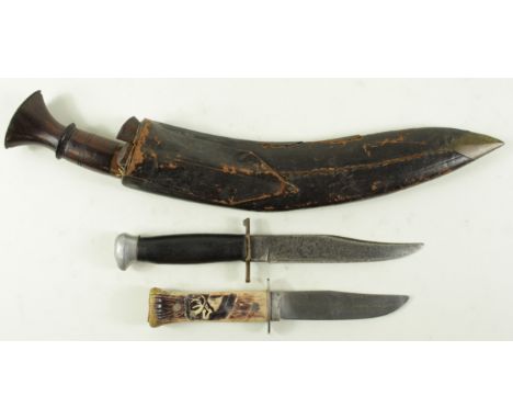 Kukri with two smaller knives and scabbard, plus two other knives without scabbards.  (3)  No Reserve