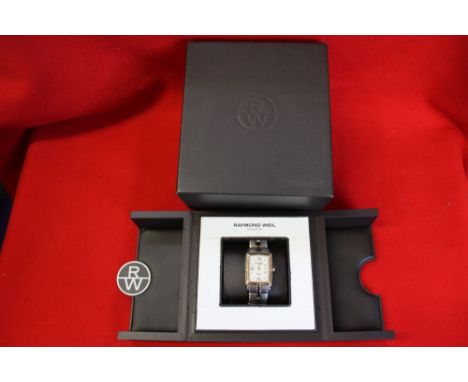 A Raymond Weil 18ct &amp; stainless steel Parsifal bracelet watch, with a tonneau shaped case &amp; a quartz movement in orig