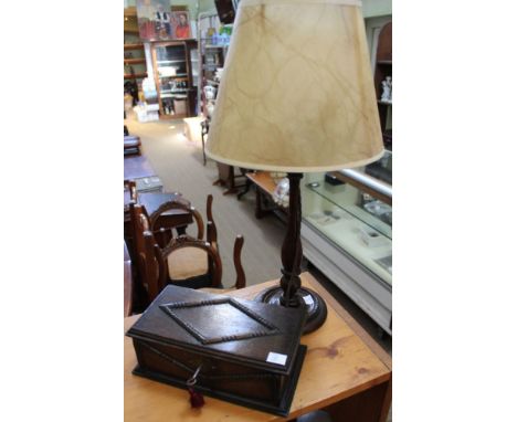 An oak table box, hinged lid with lock and key, 24cm together with an oak table lamp with shade (2)