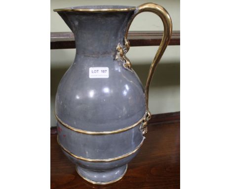 A brass mounted metal ewer, 41cm high
