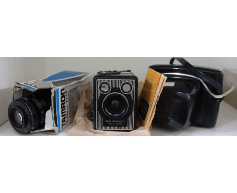 A Kodak Brownie 6-20E, a Praktika 35mm SLR MTL5 and a Tamron 20-210mm F/3.8-4 lens
