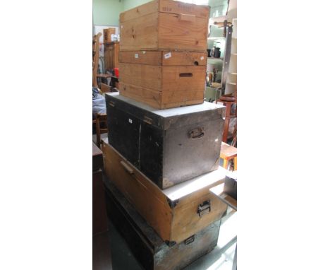 A tin trunk &amp; four wooden storage trunks