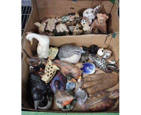 A box containing a selection of ceramic birds &amp; pigs