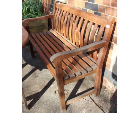 A teak garden bench