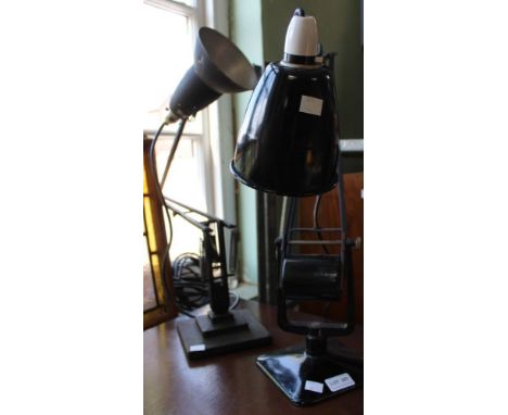 Two black Anglepoise lamps, one with a two step base. Condition: in need of rewiring, scratches, wear, marks of use, extendin