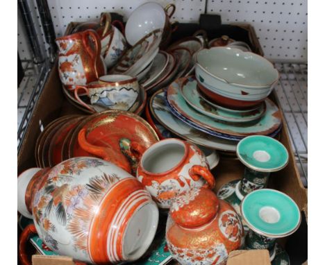 A box containing a selection of Oriental ceramic wares, part tea set, etc