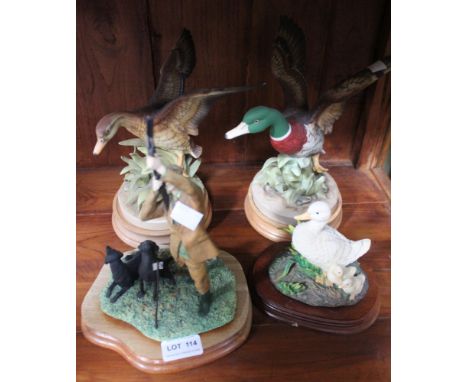 Two ceramic duck ornaments, one resin duck &amp; a resin figure of a Sporting Gun with his Labradors