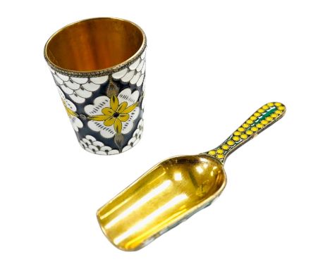 A Soviet Union 916 gilt white metal and enamel caddy spoon, 91mm and vodka tot, 44mm. Condition - good