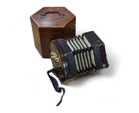 A mid-19th century Lachenal &amp; Co., London mahogany concertina, in an hexagonal mahogany case. Condition - fair to good, t