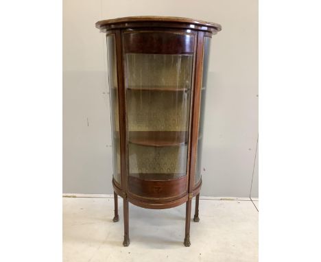 A Louis XVI style bowfront vitrine, width 69cm, depth 40cm, height 133cm. Condition - fair